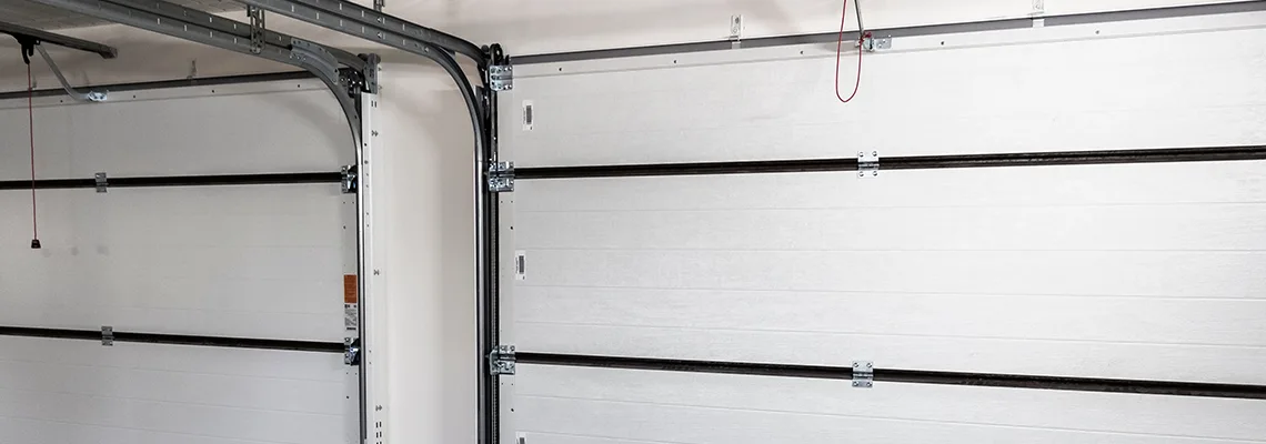 Fix Folding Garage Door Jerking in Boynton Beach